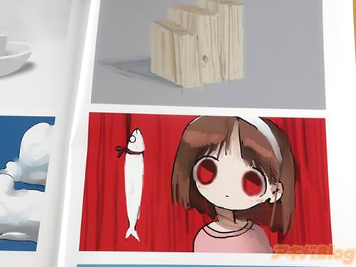 「吊るされた魚と女の子」